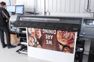 A large printer with food on it.